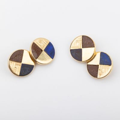 a pair of gold and lapis stone cufflinks