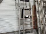 a ladder that is leaning against a wall in a garage