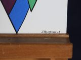 a picture of a painting of a diamond on a easel