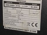 a label on the back of a black suitcase