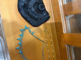 a display case with a lot of jewelry on it