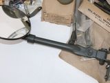 a magnifying glass and a pair of glasses on a table
