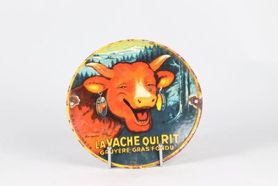 a button that has a picture of a cow on it
