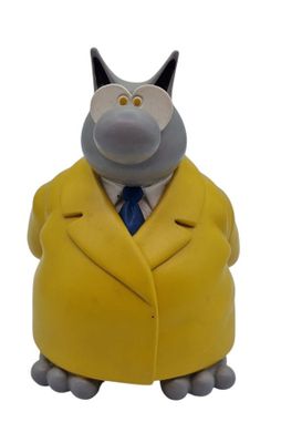 a figurine of a man in a suit and tie