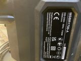 a close up of a machine with a button on it