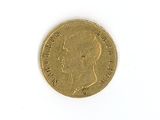an image of a gold coin on a white surface