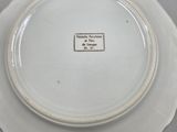 a white plate with a black and white label on it