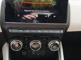 a picture of a car dashboard with a camera mounted on it