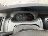 a close up of a car dashboard with a speedometer