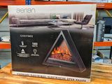 a box with a fireplace inside of it sitting on a table