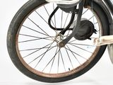 a close up view of a bicycle with a basket on the back