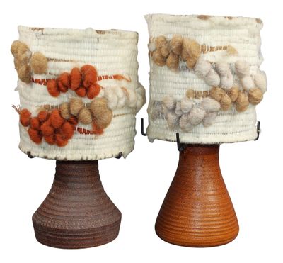 two vases that are decorated with different types of items