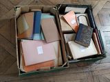 a box full of books sitting on the floor