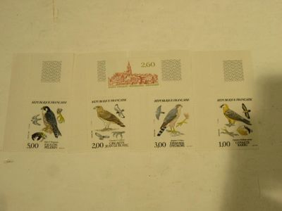 a picture of a collection of stamps with birds on them