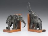 pair of bronze elephant bookends on wooden bases