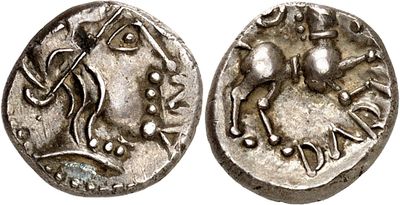 a silver coin with an image of a woman on it