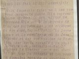 a piece of paper with writing on it sitting on a table