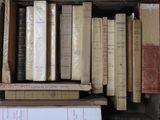 a box full of books sitting on top of a table