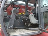 an image of a red vehicle with the driver ' s seat up