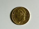 an image of a gold coin on a white surface