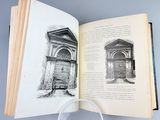 an open book with a picture of a building on it