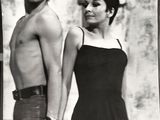 black and white photograph of a man and a woman posing for a picture