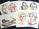 six cards with different portraits of people on them on a table