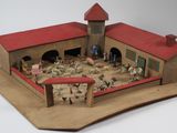 une maquette d'un bâtiment dans lequel se trouvent de nombreux animaux