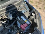 the engine of a car with its hood open and the hood down