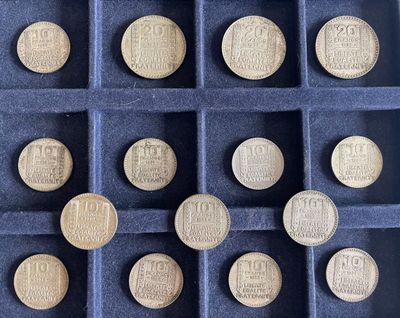 a lot of coins that are in a box