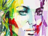 un tableau représentant le visage d'une femme, aux couleurs vives