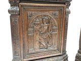 pair of antique carved wood side tables with figures on them