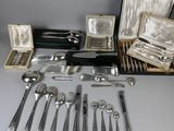 many different types of silverware and silverware in a case