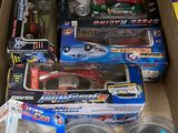 a box full of toy cars and other toys