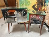 two tables that are next to each other in a room