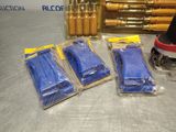 four bags of blue plastic items on a table