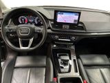 the interior of a car with a steering wheel, dashboard, and a touch screen