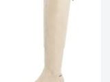 a pair of women ' s boots are shown on a white background