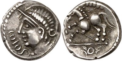 a close up of a silver coin with a horse on it