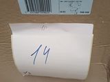 a label on a piece of paper that is attached to a toilet