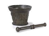 a mortar and a pest grind on a white background