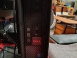 a computer on a table with a keyboard and mouse