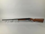 a rifle on a white background