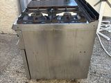a stove that is sitting in the middle of the street