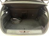 a trunk of a car with a bag in it