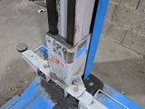 a close up of a fork lift on the ground