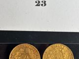 a pair of gold coins from the reign of person