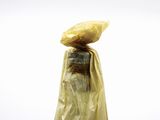 a plastic bag that has a bag on top of it