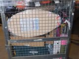 a metal cage with a table inside of it