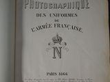 an open book with a picture of a cross on it